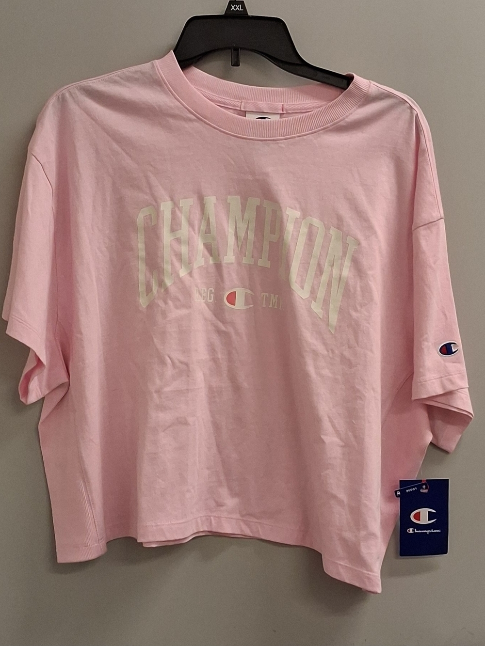 Champion Light Pink oversized, semi crop Logo Tee. NWT